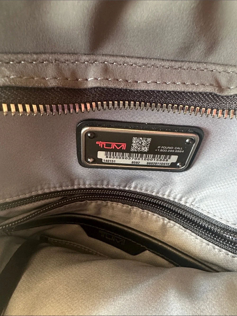 Tumi Men's Gray and Black Nylon Backpack with Center Stripe